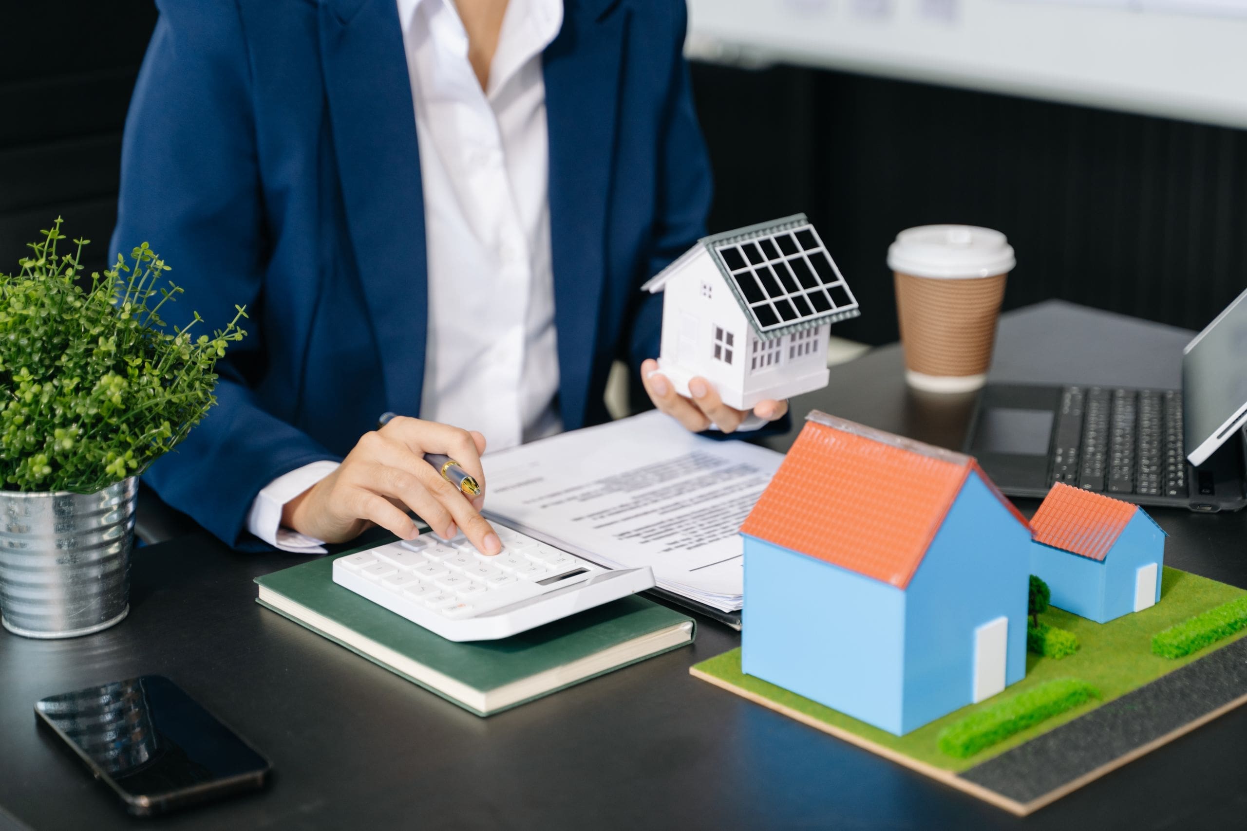 Considering buying a home, investing in real estate. Broker sign